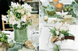 decoração da mesa dos noivos com flores brancas e folhagem